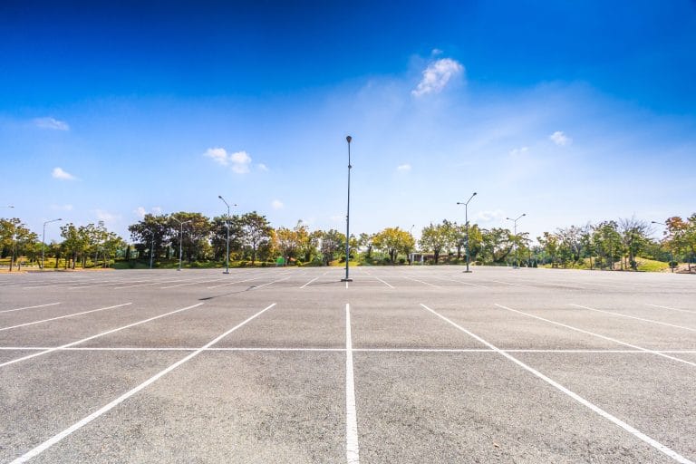 Empty Parking Lot with Clear Sky
